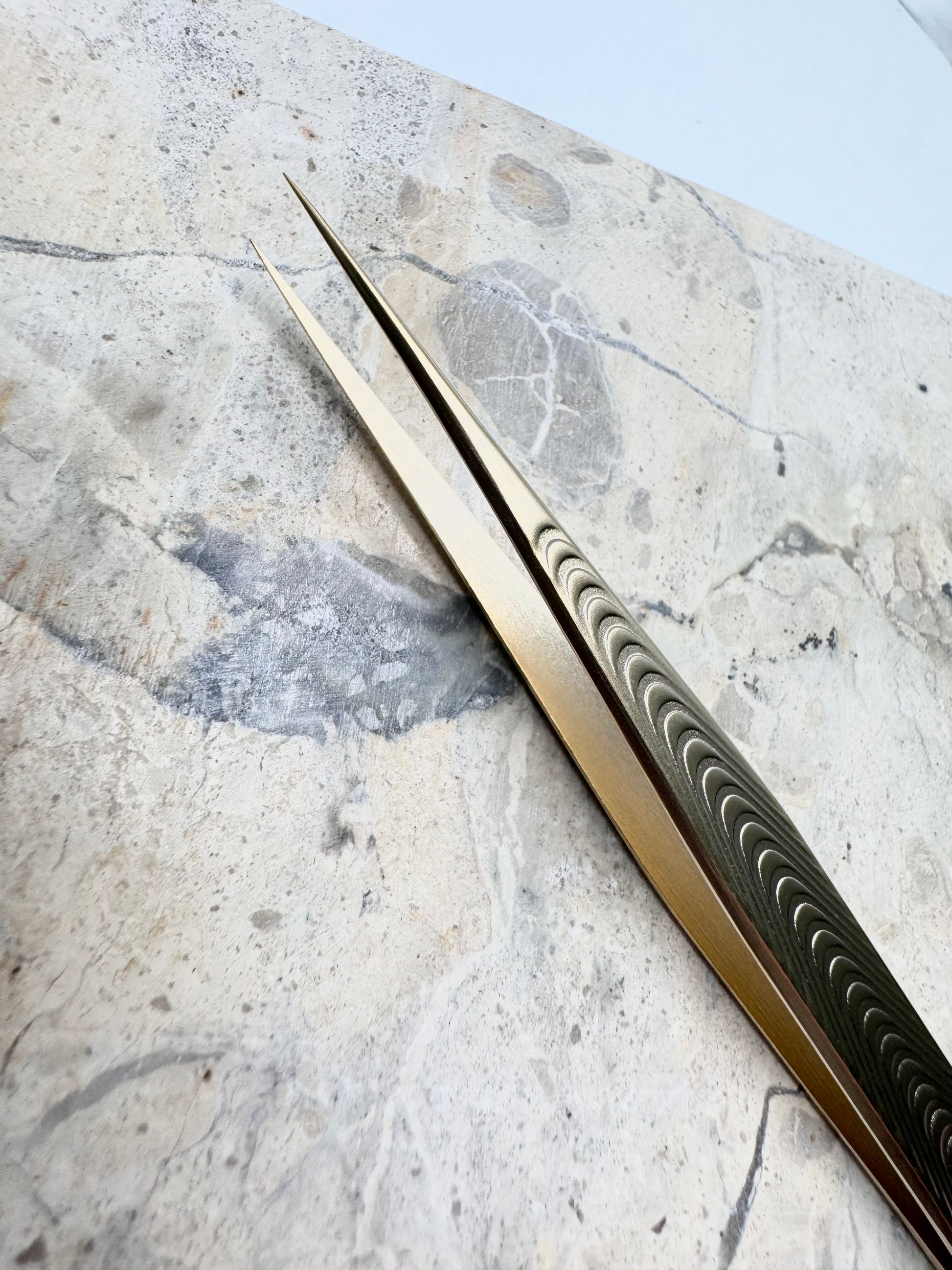 Our Gold straight Tweezer is perfect for isolation.